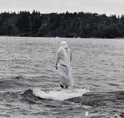 Amma at a lake