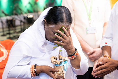 Amma blesses Vishu sapling